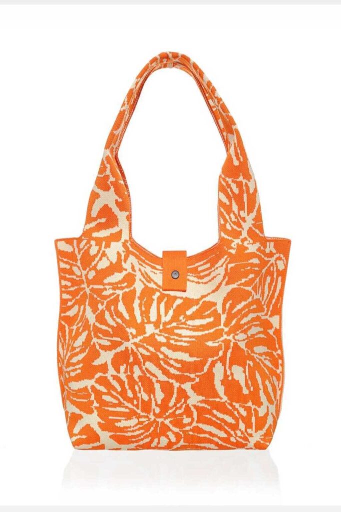 CARTERA TEJIDA CON BOTÓN (A048)